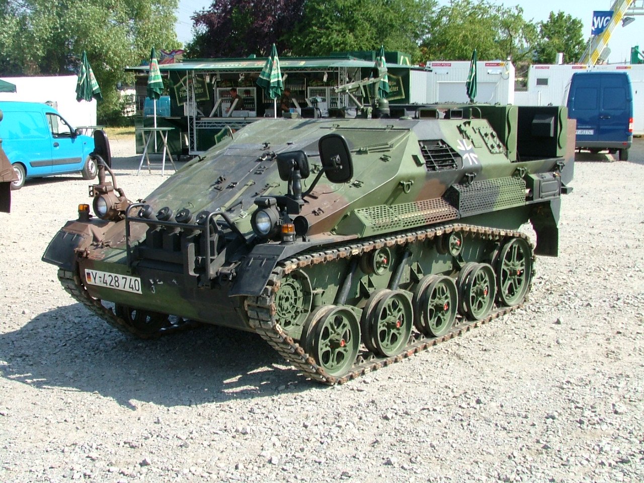 an army tank with all wheels on it