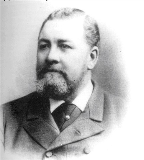 an old po of a man with a beard and moustache