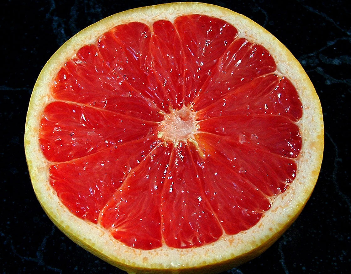 an image of a gfruit on the black background