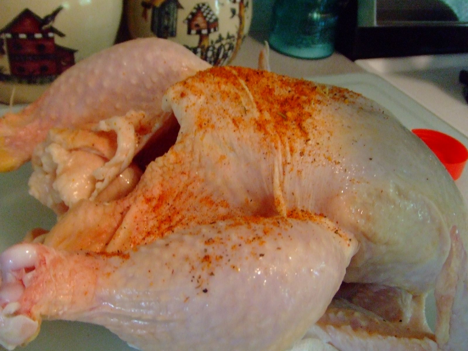 a roasted chicken that is sitting on a counter