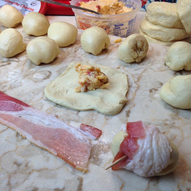 an arrangement of breads and meat and some other ingredients