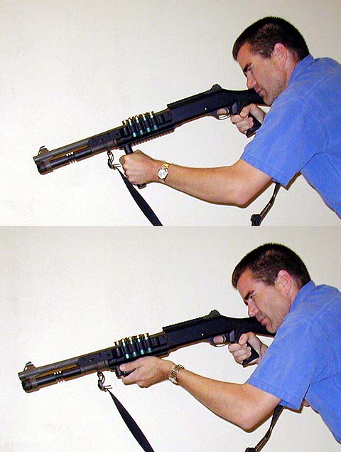 a man is aiming his weapon while holding it