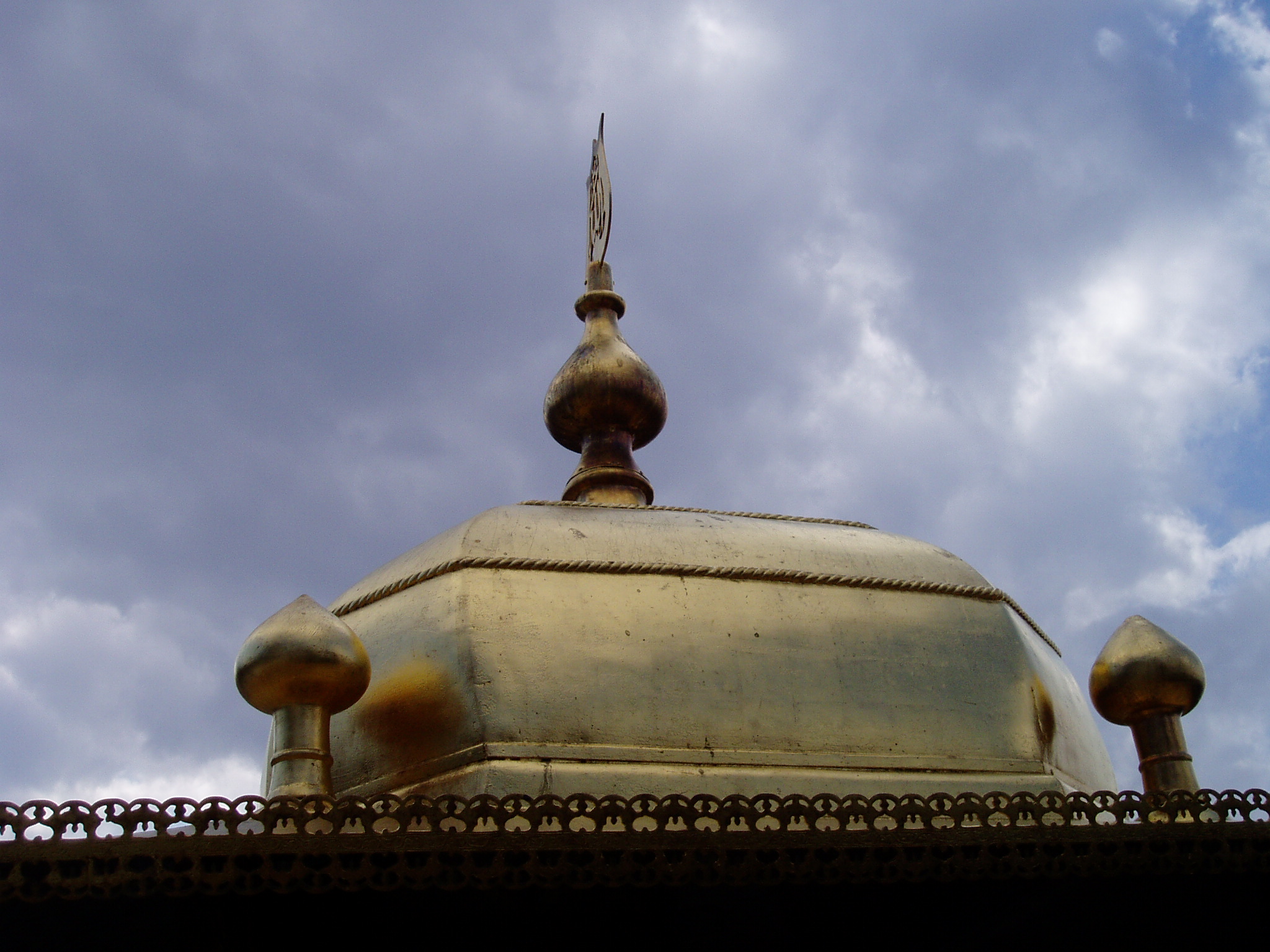 a very large and old dome that has a metal top