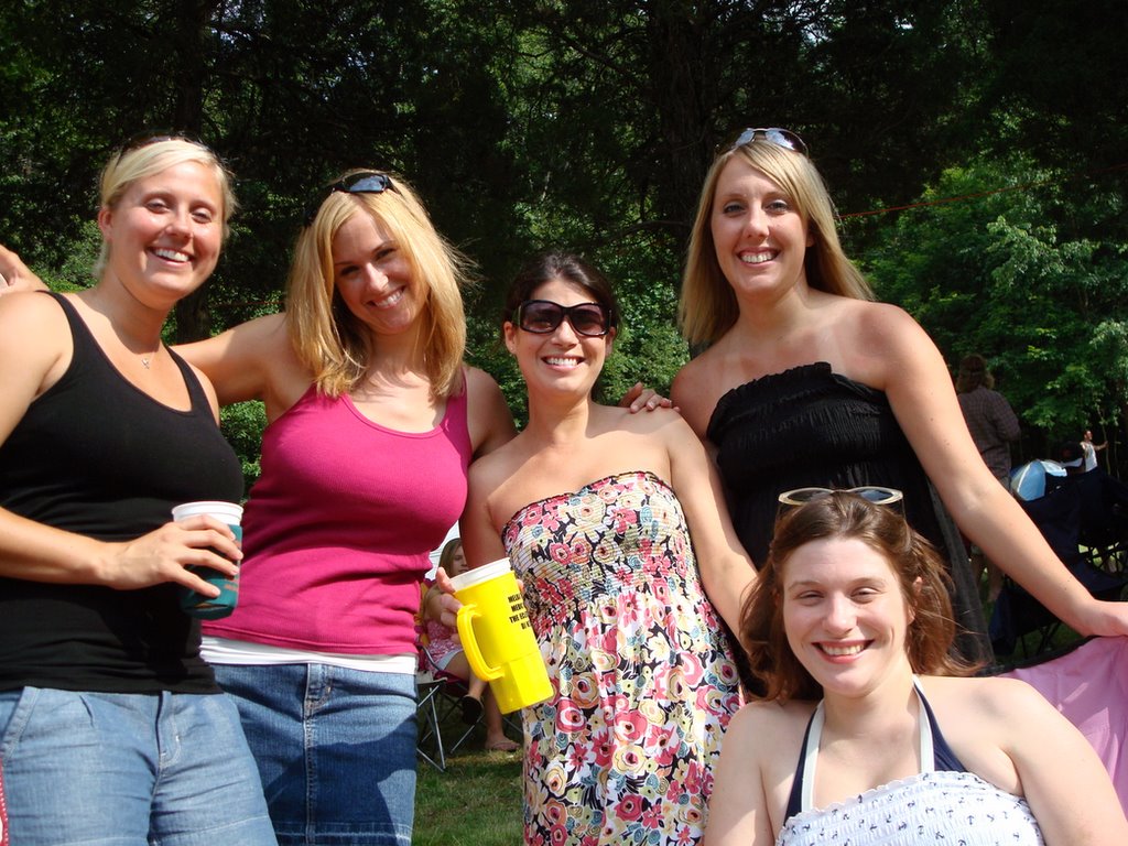 the girls are smiling and posing for a po