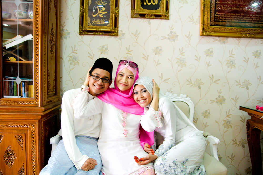 two woman taking pictures together with a cellphone