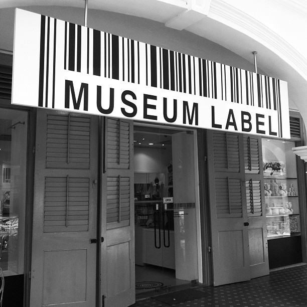 the entrance to the museum label in a building