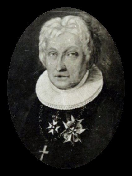 an old black and white po of a woman in a round frame