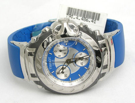 a blue watch on a white surface with a price label
