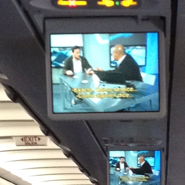 there are several tvs on a bus together