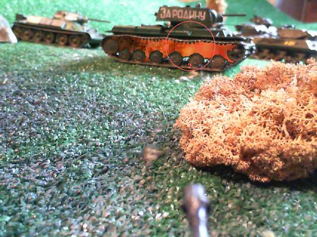military model tanks on a green surface