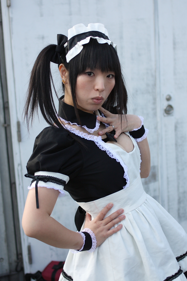 this asian model is very cute wearing white and black dress