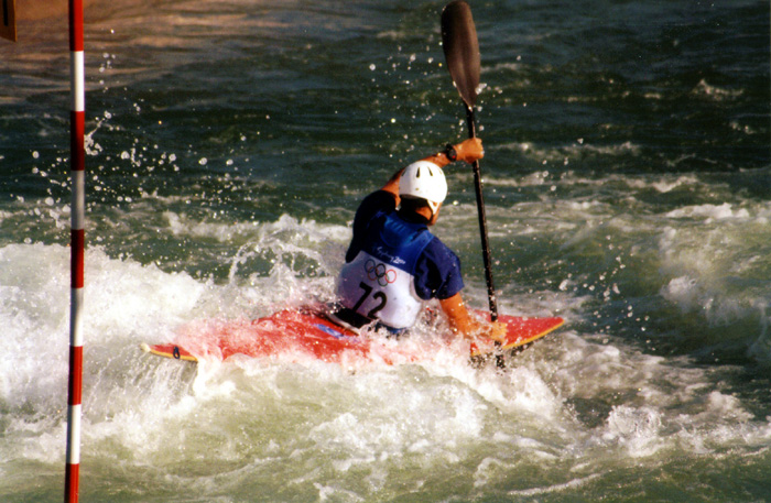 a person riding on top of a kayak