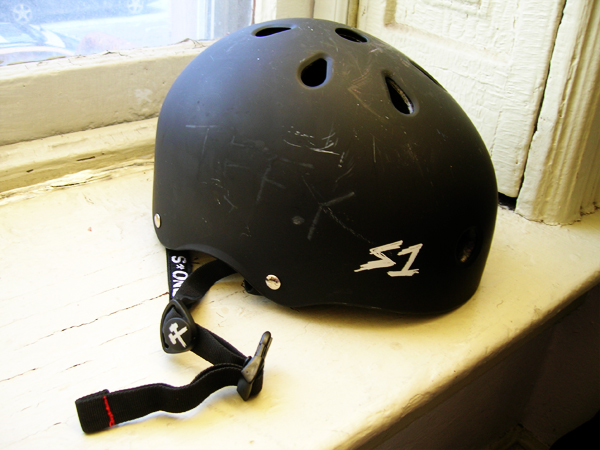 the black helmet has the word s2 written on it