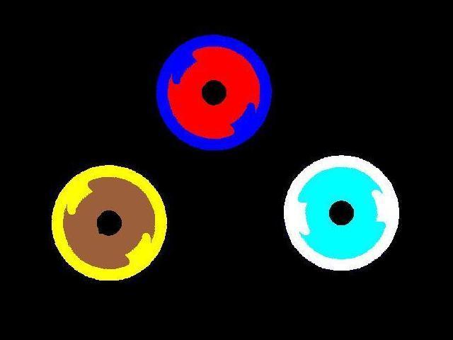 three circles in color are shown in the dark