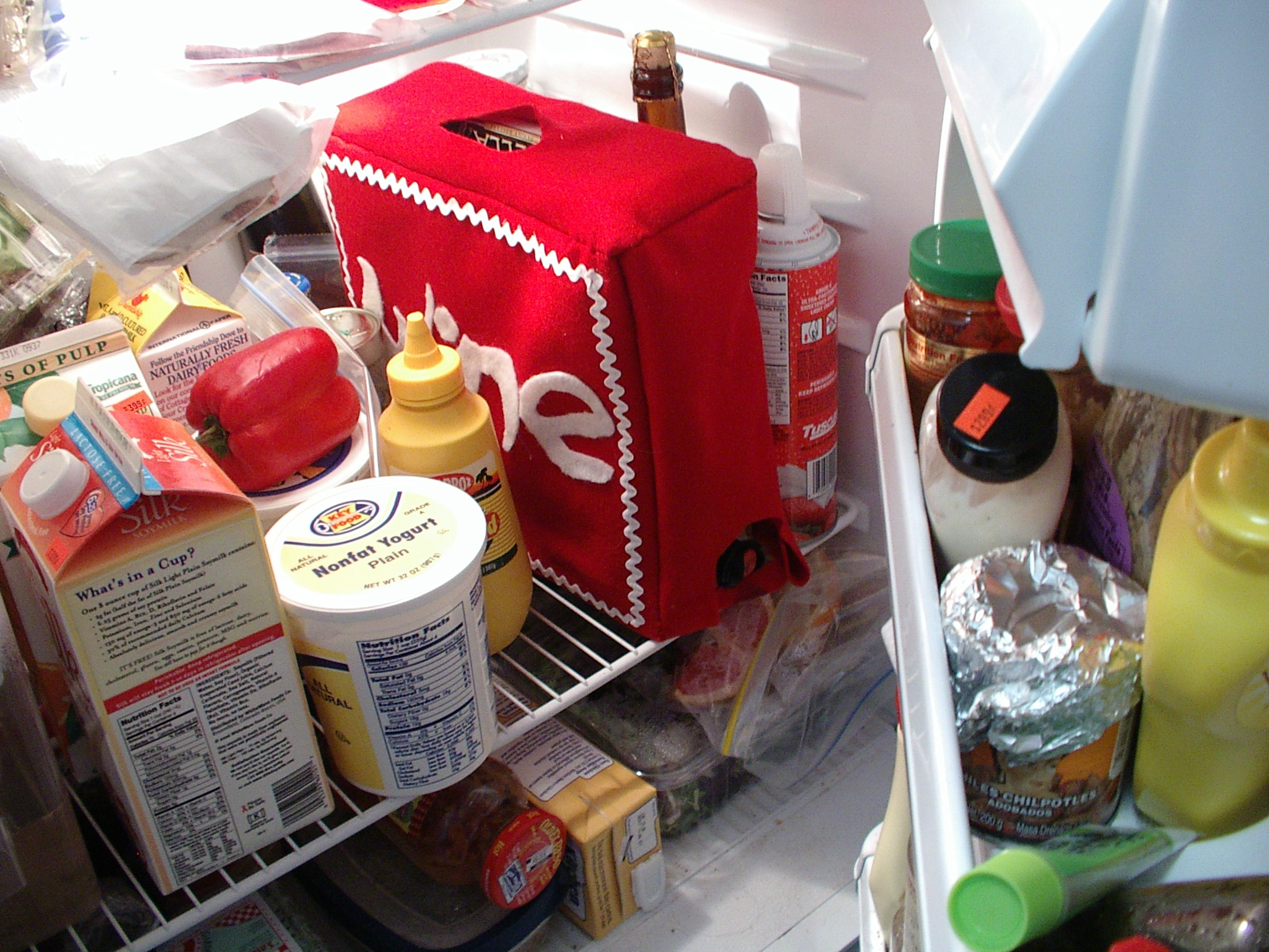 a view from the inside of a refrigerator looking at food