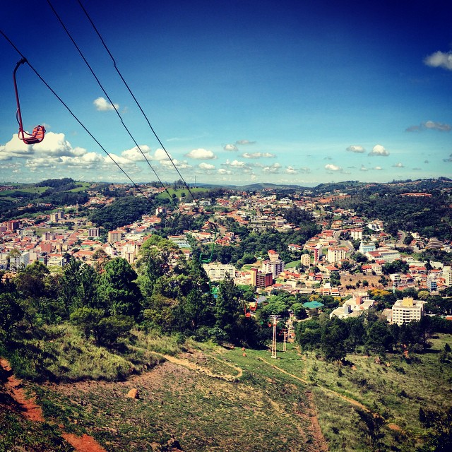 a cable car that is above a city