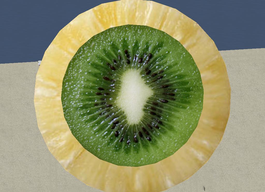 a sliced kiwi is on top of a bowl