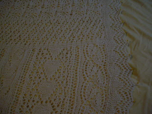 this is the top half of an antique lace crocheted blanket