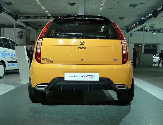 this is the rear of a small yellow car