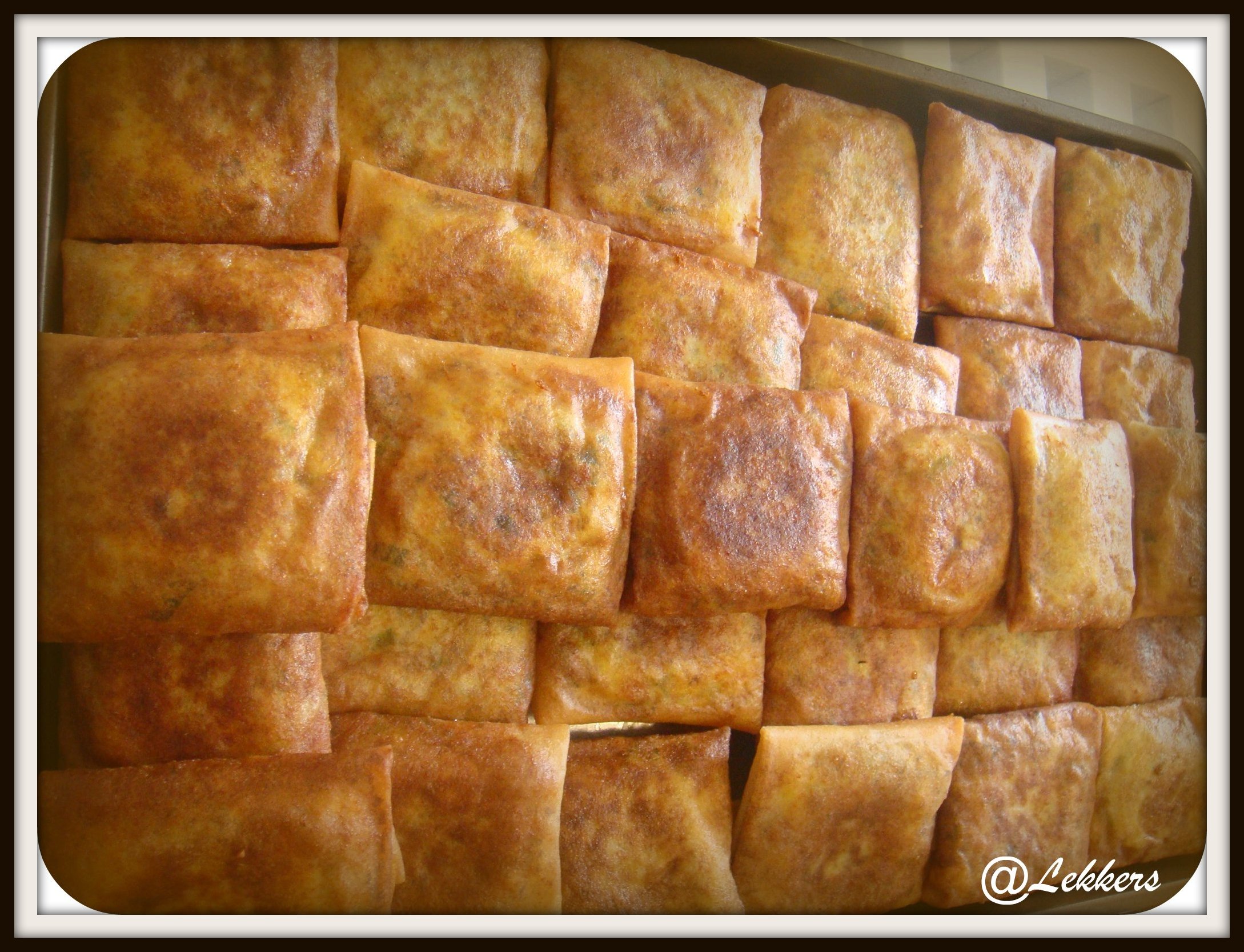 a pile of golden squares of food