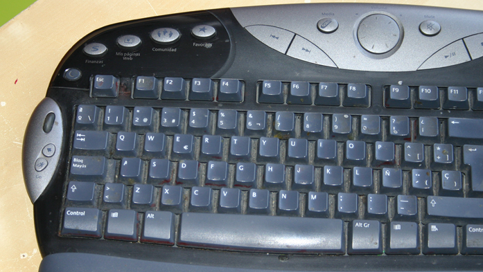 there is a computer keyboard that is black
