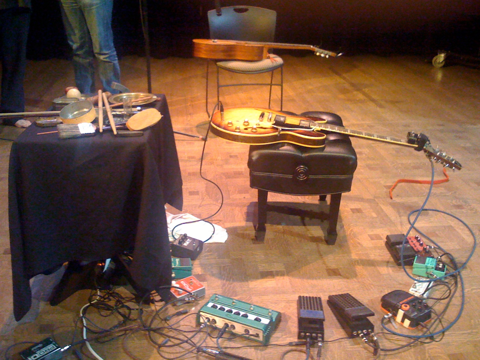 a number of different musical instruments on a floor