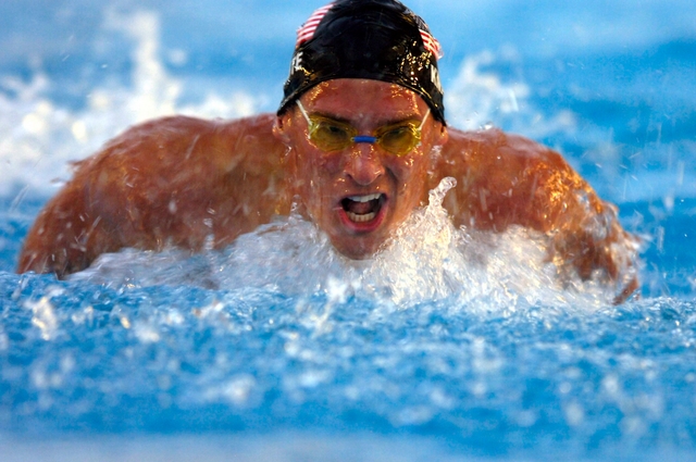 a swimmer who has fallen in the water