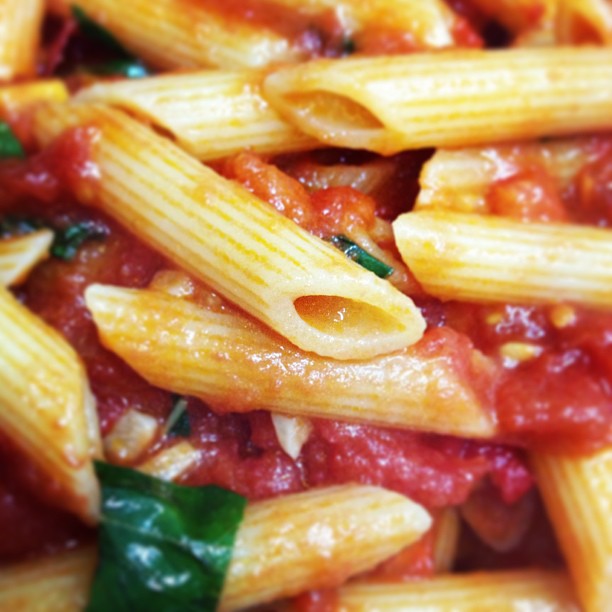 closeup of a pasta dish with spinach