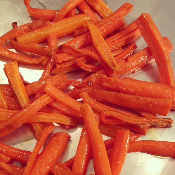 peeled carrots on a plate in a bowl