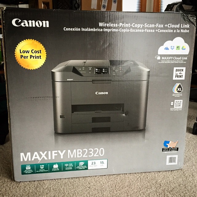 a new product of a canon printer with the box