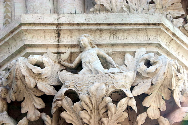 decorative sculptures in architectural style on the outside of a building