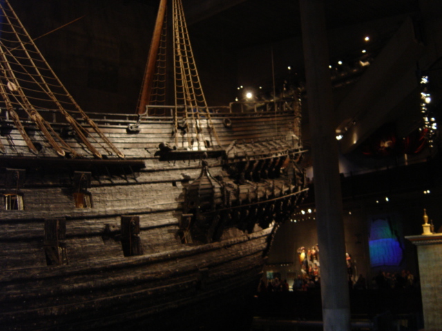 an old fashioned boat on display in a museum