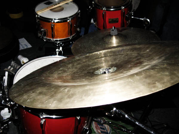 a close up of a drum set with a drum