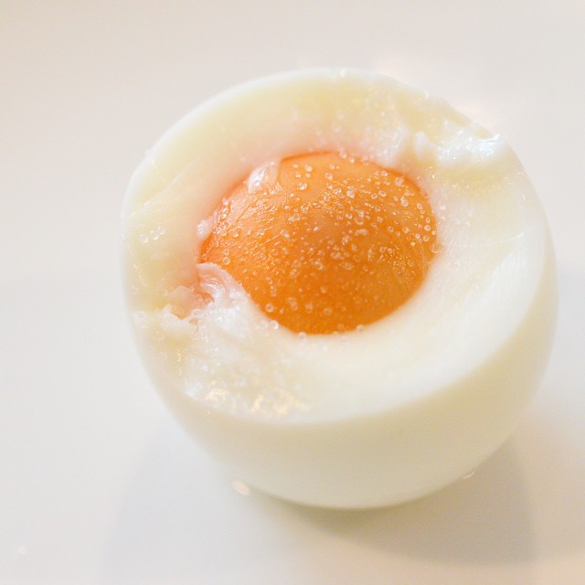 the egg has been boiled and placed in a small bowl