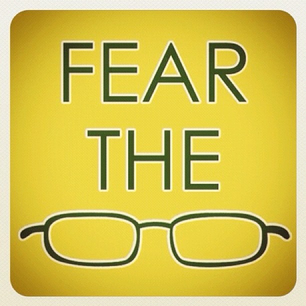 a square frame with words fear the glasses