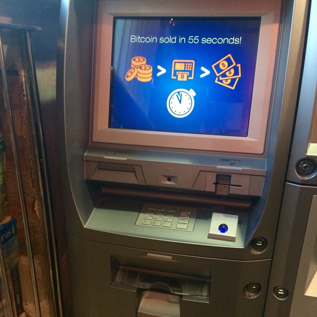 the atm machine is holding a screen for electronic purchases