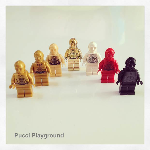 a group of lego figures next to each other