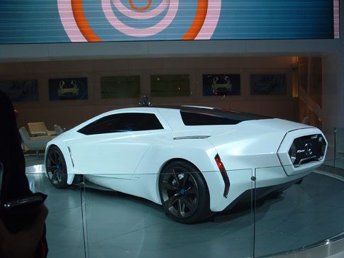 a futuristic vehicle is displayed in a room