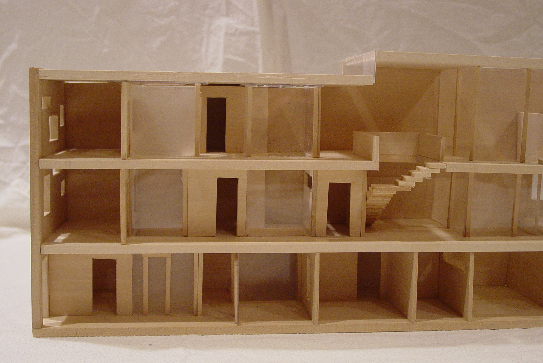 this is a small wooden model of a building