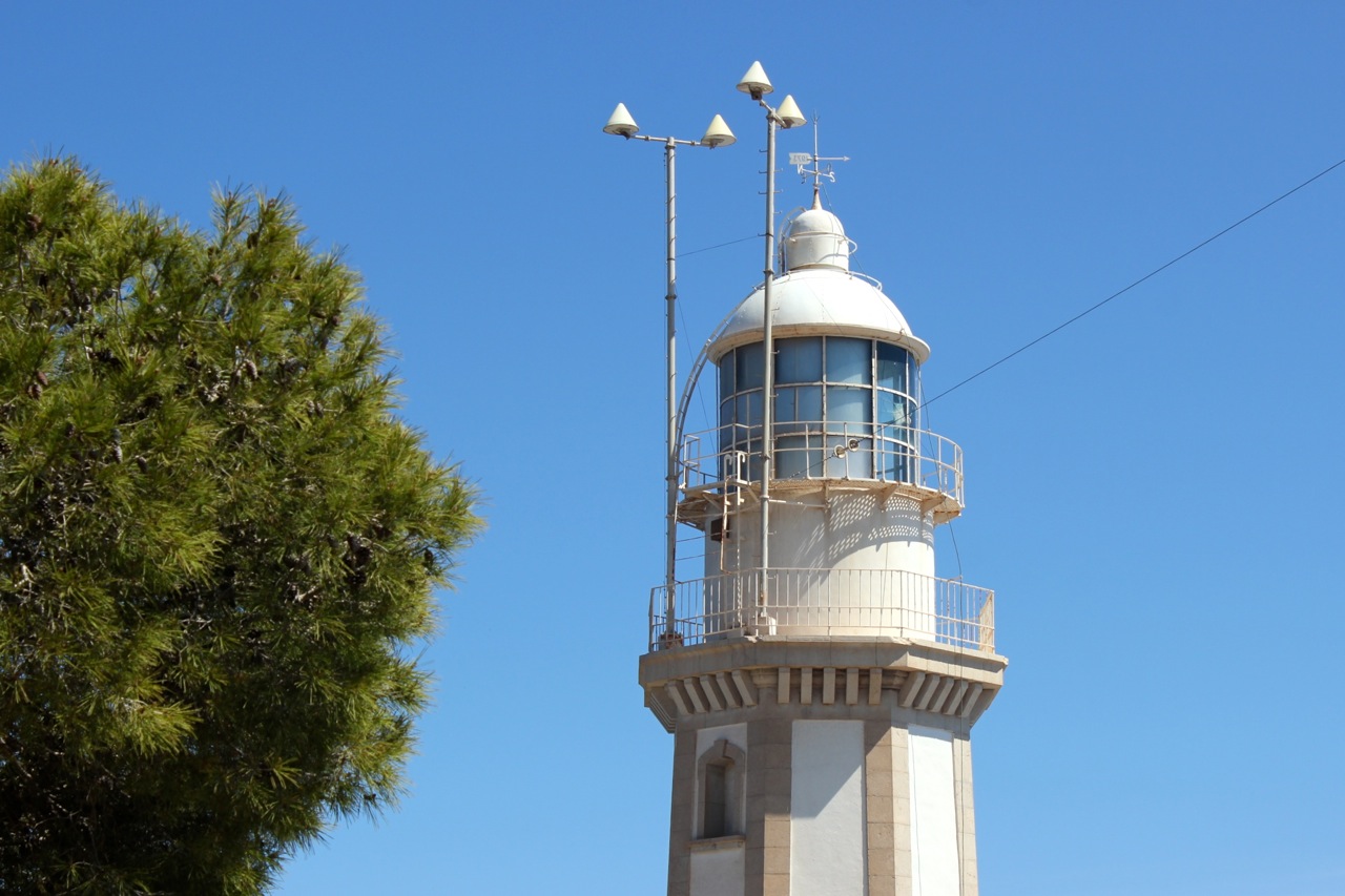 a small tower that has some lamps on top