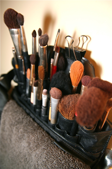a holder with lots of makeup brushes