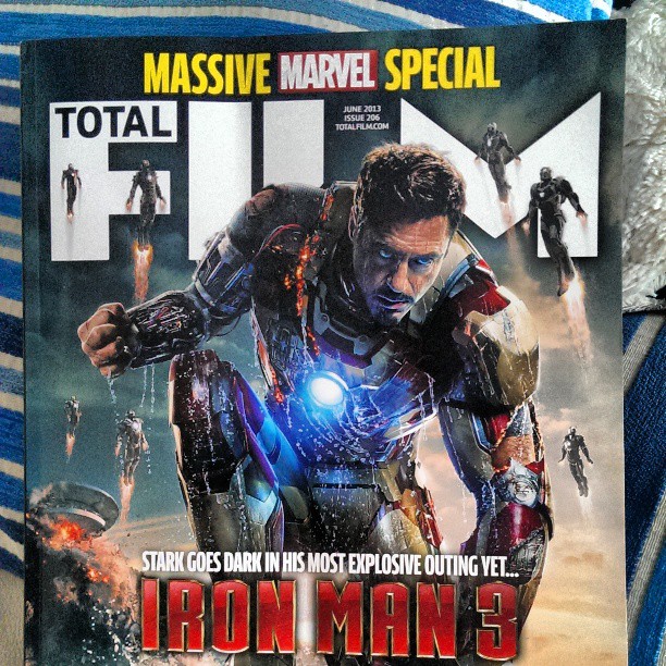 an iron man 3 poster with multiple faces