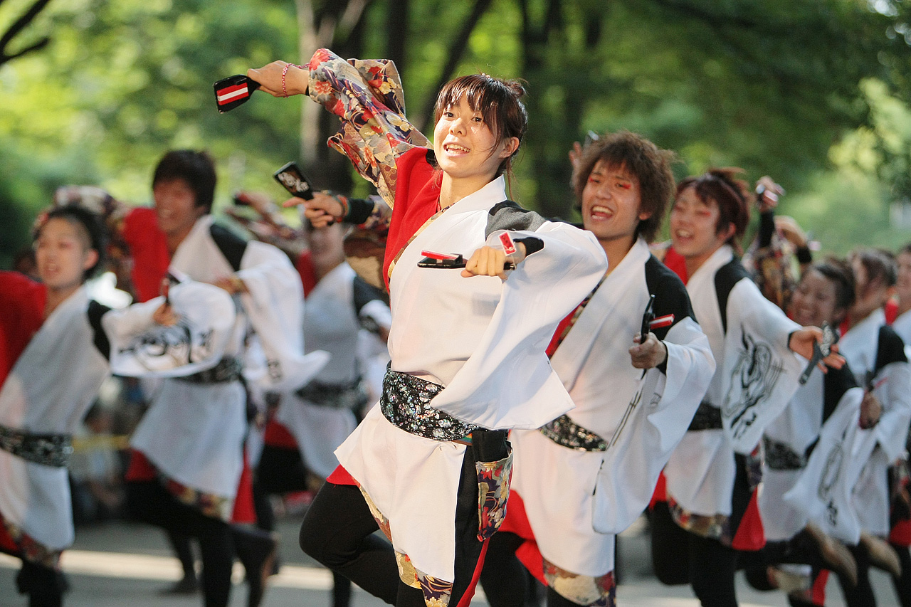 a group of people are standing outside in costume