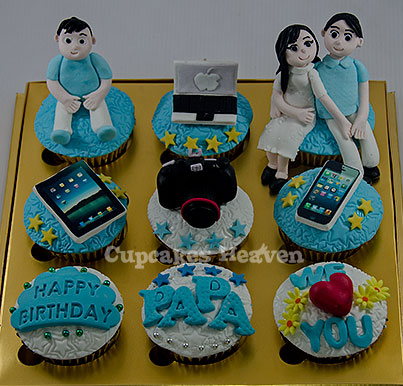cupcakes have blue frosting on top and white icing with blue and yellow decorations