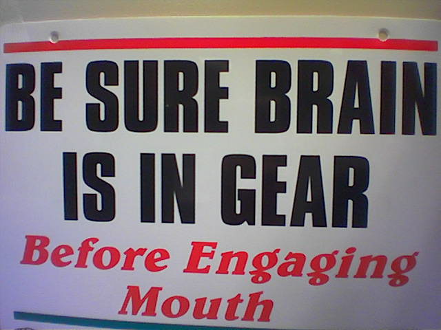 a sign warning of an approaching mouth
