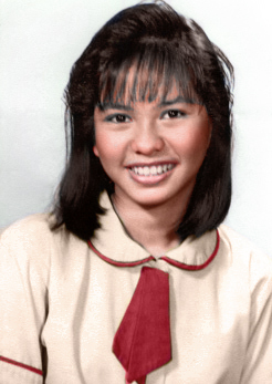 a woman wearing a shirt and tie and smiling