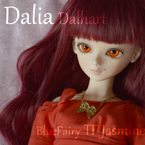 there is a doll with big yellow eyes