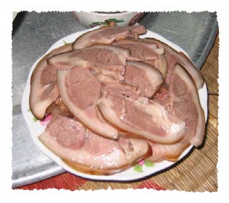 ham cut up on a plate sitting on a counter
