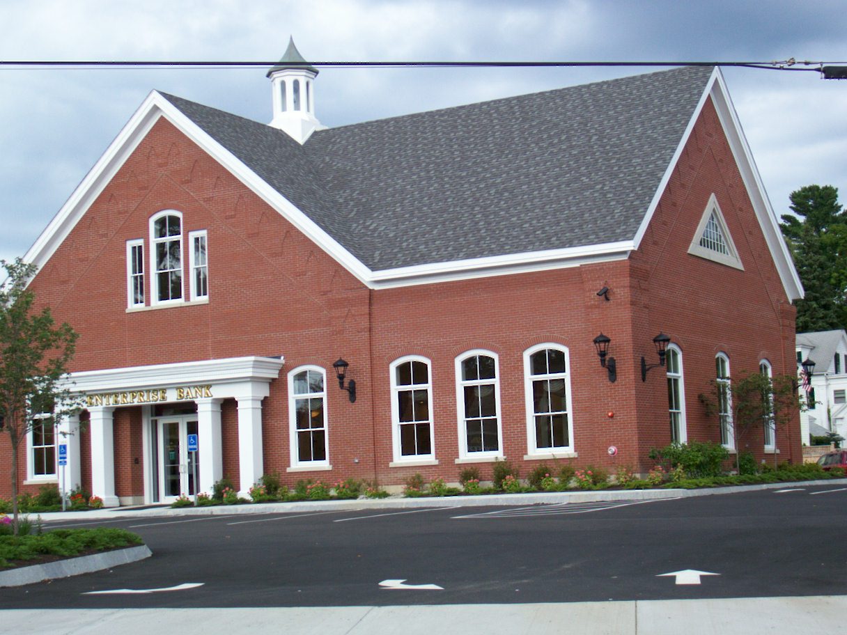 a church is on the corner of an empty street