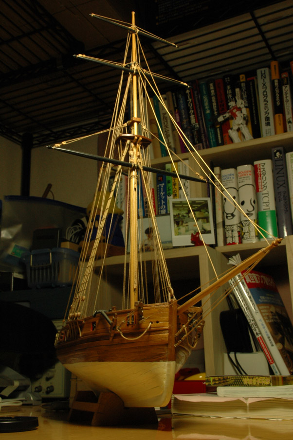 a model of a sailing boat in a room